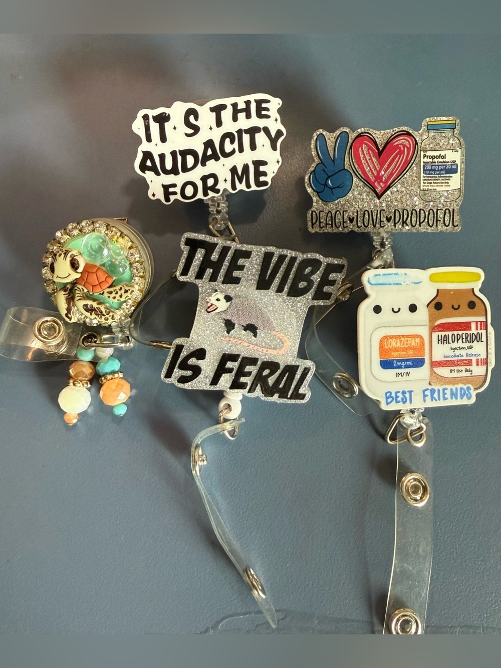 Assorted Acrylic Badge Reels - 'The Vibe is Feral' & Friends